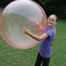 a granddaughter holding the giant jelly balloon ball